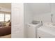 Functional laundry room with washer and dryer at 415 King George Loop, Cary, NC 27511