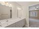 Bathroom with double sinks and large mirror at 42 Renwick Ct, Raleigh, NC 27615