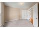 Neutral bedroom with plush carpet and a bright window, providing a comfortable space at 42 Renwick Ct, Raleigh, NC 27615