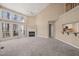 Bright, open living room with tall ceilings and a fireplace, perfect for entertaining at 42 Renwick Ct, Raleigh, NC 27615