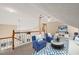 Inviting loft area with comfortable seating and a view of the lower level at 42 Renwick Ct, Raleigh, NC 27615