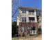 Inviting condo building with brick facade and charming balconies, offering a blend of classic and modern design elements at 421 Glencrest Pl, Chapel Hill, NC 27514