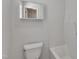Bathroom with a toilet, bathtub and recessed mirrored cabinet at 4622 Vendue Range Dr, Raleigh, NC 27604