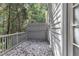 Outdoor deck offers a serene view of the surrounding trees and lush landscape at 4622 Vendue Range Dr, Raleigh, NC 27604