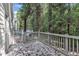 Spacious deck overlooks a backyard full of trees, creating a peaceful retreat at 4622 Vendue Range Dr, Raleigh, NC 27604