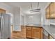 Spacious dining room showing hardwood floors and trim leading to other rooms at 4622 Vendue Range Dr, Raleigh, NC 27604
