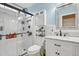 A modern bathroom with a glass-enclosed shower, vanity, and sleek fixtures at 512 Tryst Ln, Wake Forest, NC 27587