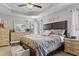 Main bedroom with tray ceiling, sitting area and natural light at 512 Tryst Ln, Wake Forest, NC 27587