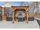 Outdoor kitchen with grill, food prep area, and covered structure offers a great space for entertaining at 512 Tryst Ln, Wake Forest, NC 27587
