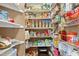 Walk-in pantry features custom shelving providing ample storage space at 512 Tryst Ln, Wake Forest, NC 27587
