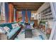 Covered outdoor patio with curtains and seating offering a cozy and inviting space at 512 Tryst Ln, Wake Forest, NC 27587