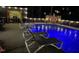 Inviting pool area with outdoor grilling station and comfortable lounge furniture for relaxing at 512 Tryst Ln, Wake Forest, NC 27587
