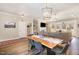 Dining area featuring stylish lighting and an open flow to the living space, perfect for Gathering meals at 560 Waterstone Ln, Henderson, NC 27537