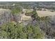 Secluded, wooded acreage with a winding drive, ideal for a private home surrounded by nature's beauty at 577 Dixon Rd # D, Willow Springs, NC 27592