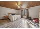 Bright bedroom boasts a spacious layout, natural light, and warm wood ceiling, creating a cozy retreat at 577 Dixon Rd # D, Willow Springs, NC 27592