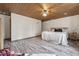 Spacious bedroom with wood ceiling, offering ample space and natural light, ideal for rest and relaxation at 577 Dixon Rd # D, Willow Springs, NC 27592
