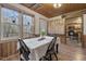 Bright dining room with a view to the kitchen, lots of natural light, and vintage furnishings at 577 Dixon Rd # D, Willow Springs, NC 27592