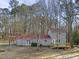Charming home showcasing a red roof, ample space, and serene surroundings, ideal for peaceful living at 577 Dixon Rd # D, Willow Springs, NC 27592