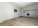 Unfinished garage space with concrete floors and exposed electrical outlets ready for your design ideas at 577 Dixon Rd # D, Willow Springs, NC 27592