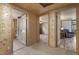 Cozy living space features wood paneling and entryways to the bathroom and seating area at 577 Dixon Rd # D, Willow Springs, NC 27592