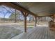 Expansive covered porch, perfect for outdoor entertaining with a beautiful backyard view at 577 Dixon Rd # D, Willow Springs, NC 27592