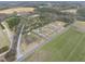 Rural acreage with farm house, farm fields and access to a small lake at 582 Ebenezer Church Rd, Coats, NC 27521