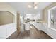 Well-appointed kitchen with white cabinetry, an island, and a view of the outdoors at 582 Ebenezer Church Rd, Coats, NC 27521