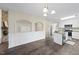 Modern kitchen featuring an island, granite countertops, and stainless steel appliances at 582 Ebenezer Church Rd, Coats, NC 27521