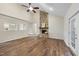 Spacious living room with vaulted ceilings, a stone fireplace, and ample natural light at 582 Ebenezer Church Rd, Coats, NC 27521