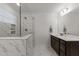Stylish bathroom featuring a glass-enclosed shower and an elegant vanity at 8620 Secreto Dr, Raleigh, NC 27606