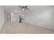 Upstairs bonus room featuring plush carpeting and lots of natural light at 8620 Secreto Dr, Raleigh, NC 27606