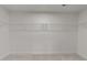 Walk-in closet with carpet and wire shelving at 8620 Secreto Dr, Raleigh, NC 27606