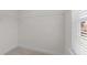 Walk-in closet with white walls, beige carpet and wire shelving at 8620 Secreto Dr, Raleigh, NC 27606