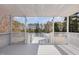 White washed back porch overlooking trees and scenic landscape at 902 Zion Church Rd, Sanford, NC 27330