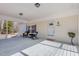 Relaxing covered front porch with rocking chairs and a potted plant at 902 Zion Church Rd, Sanford, NC 27330