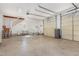 Spacious garage with high ceilings, multiple doors and windows, and room for storage and projects at 902 Zion Church Rd, Sanford, NC 27330