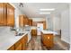 Bright kitchen with white appliances, tile backsplash, and white countertops at 902 Zion Church Rd, Sanford, NC 27330