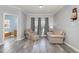 Cozy living room featuring comfortable seating and natural light from the window at 902 Zion Church Rd, Sanford, NC 27330