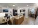 Spacious living area with fireplace seamlessly connects to the kitchen and dining room for easy living at 913 Thimbleweed Way, Wake Forest, NC 27587