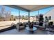 Screened patio with comfortable seating area, perfect for relaxing outdoors at 913 Thimbleweed Way, Wake Forest, NC 27587