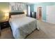 Tranquil main bedroom features a plush bed, soft lighting, and ensuite bathroom at 100 Pinto Saddle Ct, Garner, NC 27529