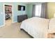 Serene bedroom with en-suite bathroom, TV, closet and plenty of natural light at 100 Pinto Saddle Ct, Garner, NC 27529