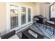 A cozy screened in porch features outdoor seating, a table, and access to the backyard at 100 Pinto Saddle Ct, Garner, NC 27529