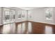An expansive living room with hardwood floors and plenty of natural light at 1015 Rexburg Dr, Cary, NC 27513