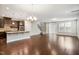 Inviting living space with an open layout, blending kitchen, dining, and living areas at 1015 Rexburg Dr, Cary, NC 27513