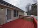View of the back deck featuring a painted surface and entry door to the home at 1032 Holly Pointe Dr, Wendell, NC 27591