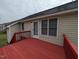 View of the back deck featuring a painted surface and entry door to the home at 1032 Holly Pointe Dr, Wendell, NC 27591
