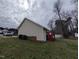 Exterior view of the backyard featuring grass and access to the deck at 1032 Holly Pointe Dr, Wendell, NC 27591