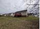 View of the backyard featuring the deck, siding, and other homes at 1032 Holly Pointe Dr, Wendell, NC 27591