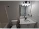Bathroom boasting modern fixtures, updated lighting, and neutral colors at 1032 Holly Pointe Dr, Wendell, NC 27591